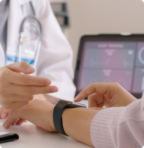 Clinician using a tablet with health data